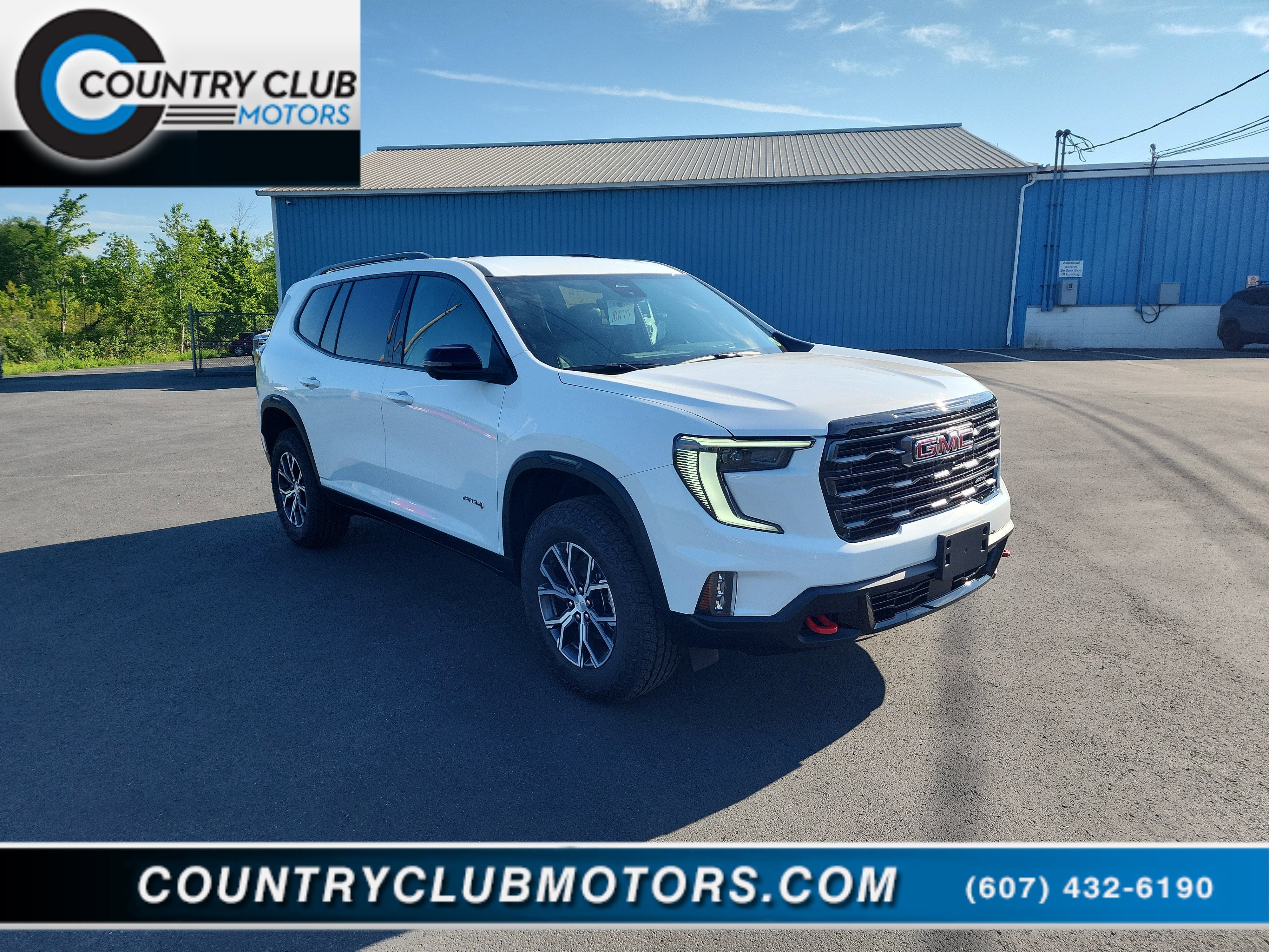 2026 GMC Acadia AT4 in Summit White — front three-quarter view