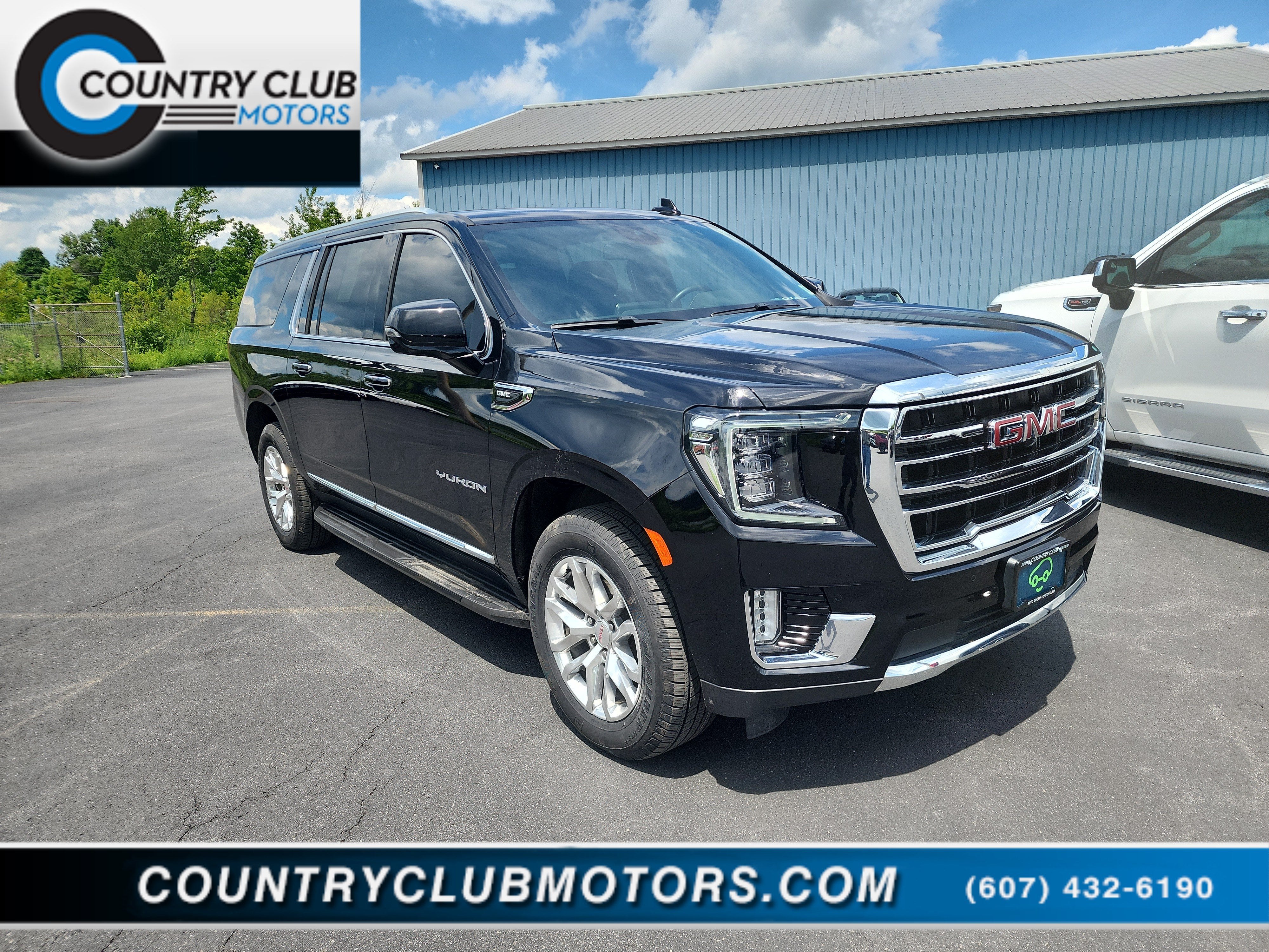 2024 GMC Yukon XL SLT in Onyx Black — front three-quarter view