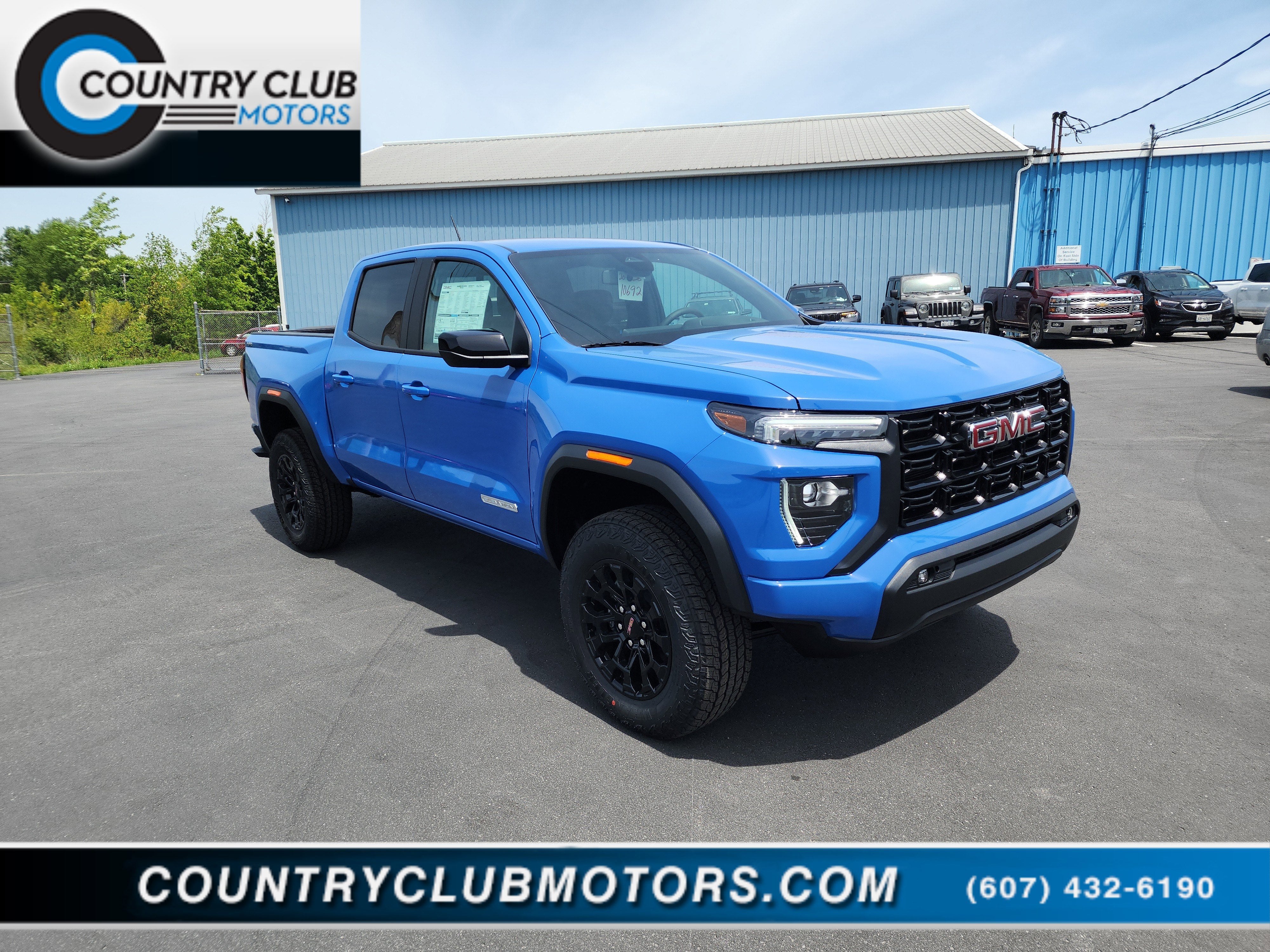 2026 GMC Canyon Elevation in Rapids Metallic — front three-quarter view
