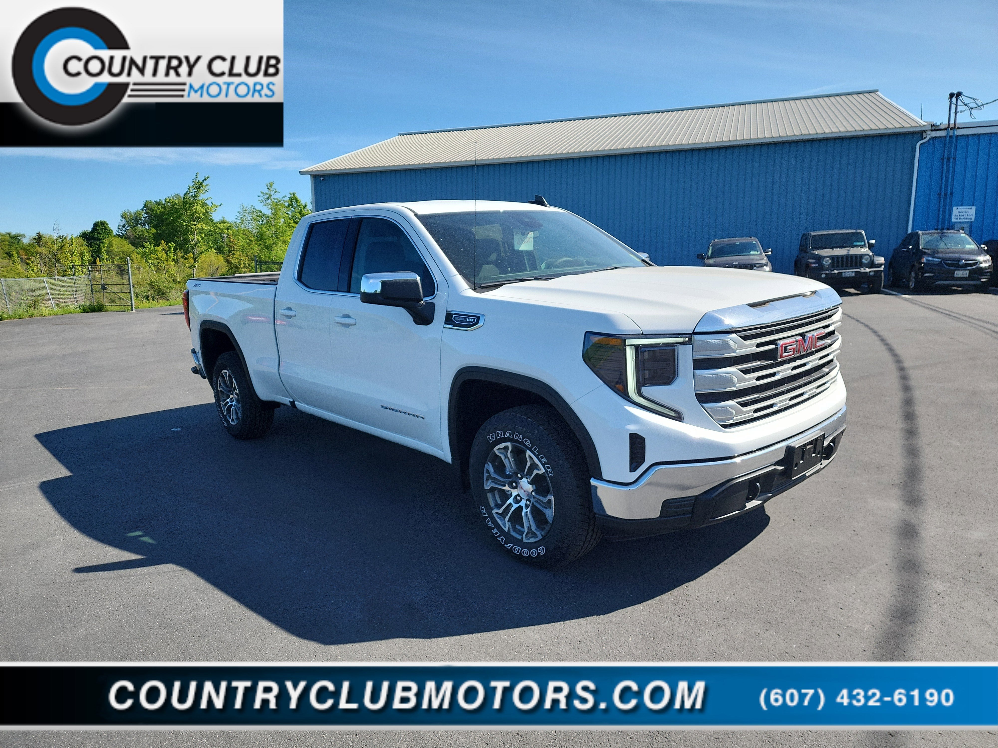 2026 GMC Sierra 1500 SLE in Summit White — front three-quarter view