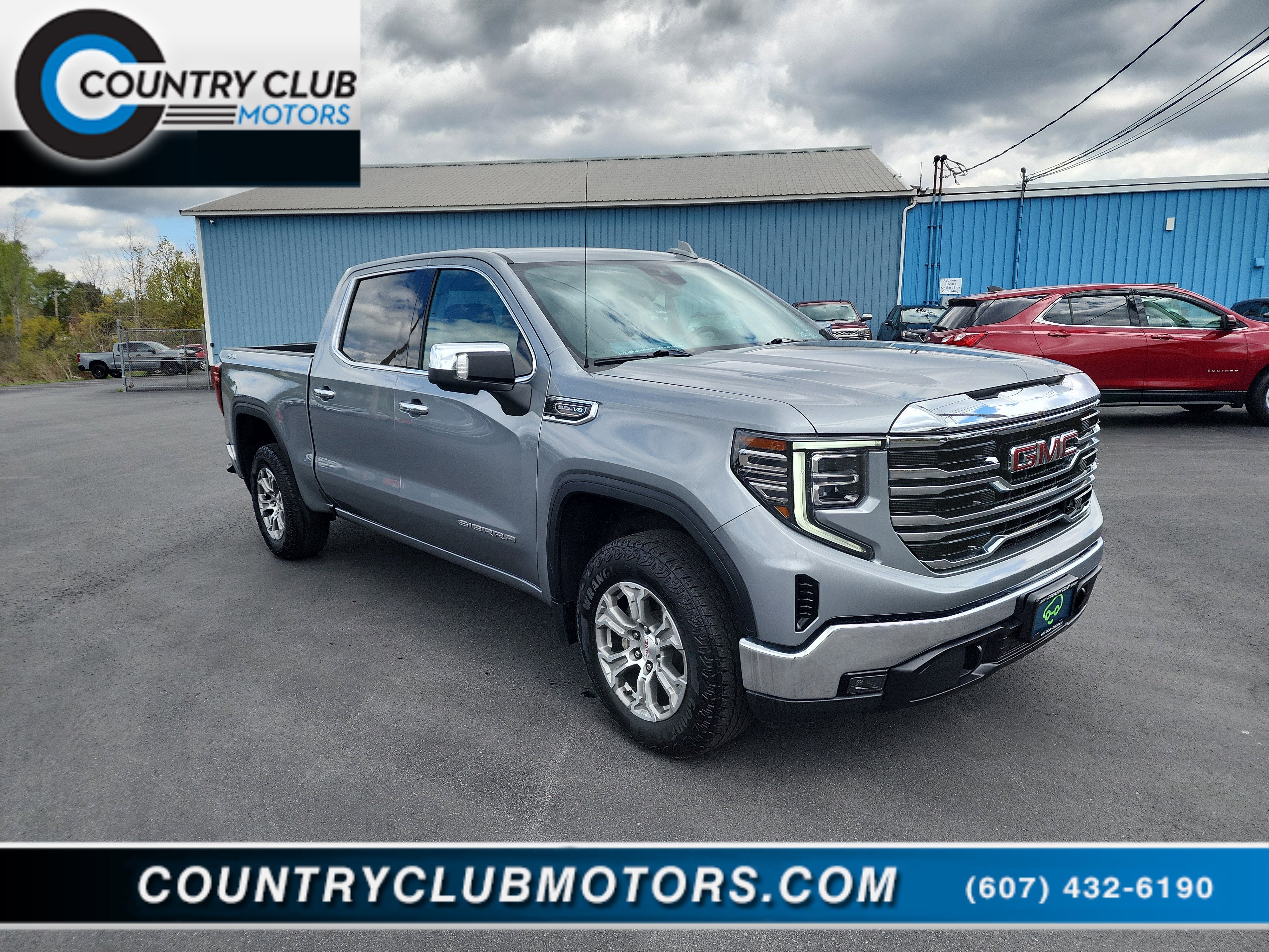 2024 GMC Sierra 1500 SLT in Sterling Metallic — front three-quarter view